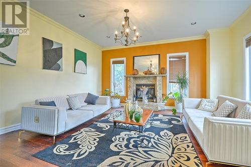 2600 Chick Court, Windsor, ON - Indoor Photo Showing Living Room With Fireplace