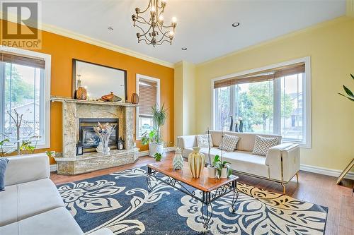 2600 Chick Court, Windsor, ON - Indoor Photo Showing Living Room With Fireplace