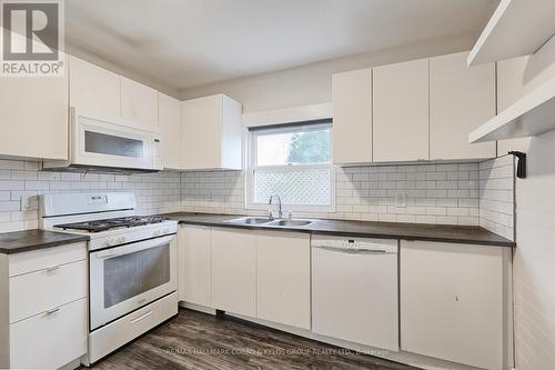 4910 Bridge Street, Niagara Falls, ON - Indoor Photo Showing Kitchen With Double Sink