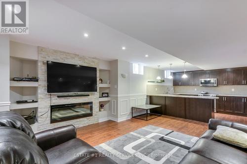 135 Elbern Markell Drive, Brampton, ON - Indoor Photo Showing Other Room With Fireplace