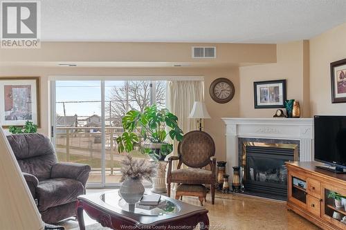 99 Robson Road, Leamington, ON - Indoor Photo Showing Living Room With Fireplace