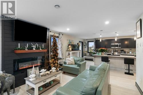 22 Phoenix Drive, Paradise, NL - Indoor Photo Showing Living Room With Fireplace