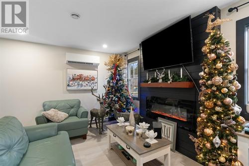 22 Phoenix Drive, Paradise, NL - Indoor Photo Showing Living Room With Fireplace