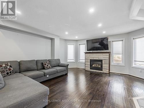 5439 Razor Bill Court, Mississauga, ON - Indoor Photo Showing Living Room With Fireplace