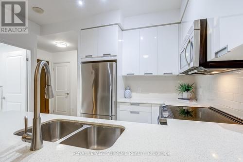 601 - 75 Eglinton Avenue W, Mississauga, ON - Indoor Photo Showing Kitchen With Double Sink