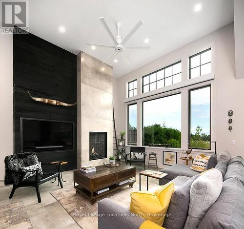 153 Georgian Bay Lane, Blue Mountains (Blue Mountain Resort Area), ON - Indoor Photo Showing Living Room With Fireplace