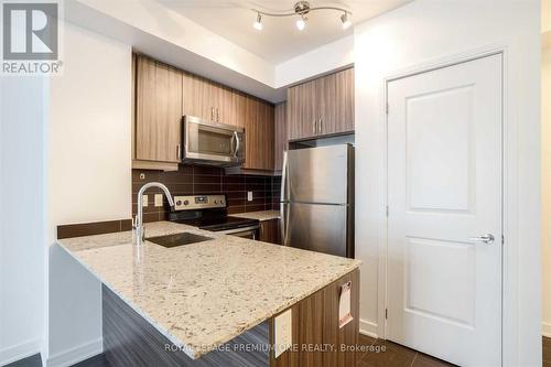 707 - 9199 Yonge Street, Richmond Hill, ON - Indoor Photo Showing Kitchen With Stainless Steel Kitchen With Double Sink With Upgraded Kitchen