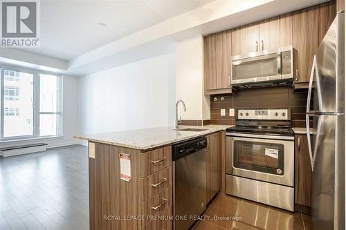 707 - 9199 Yonge Street, Richmond Hill, ON - Indoor Photo Showing Kitchen With Stainless Steel Kitchen