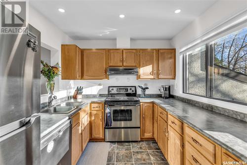 7 455 Pinehouse Drive, Saskatoon, SK - Indoor Photo Showing Kitchen With Double Sink