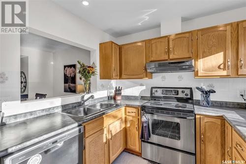 7 455 Pinehouse Drive, Saskatoon, SK - Indoor Photo Showing Kitchen With Double Sink