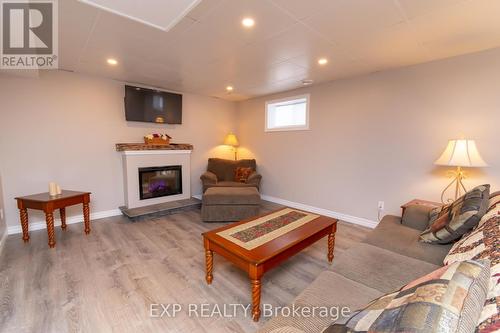 56 Becketts Side Road, Tay, ON - Indoor Photo Showing Living Room With Fireplace