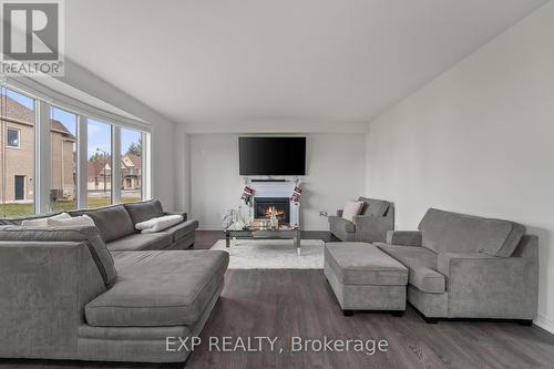 113 Rugman Crescent, Springwater, ON - Indoor Photo Showing Living Room With Fireplace