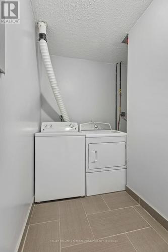 304 - 733 Deveron Crescent E, London, ON - Indoor Photo Showing Laundry Room