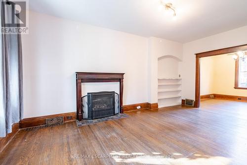 26 Ontario Avenue, Hamilton, ON - Indoor Photo Showing Living Room With Fireplace