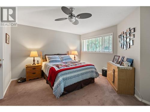 130 Dundas Road Unit# 5, Kelowna, BC - Indoor Photo Showing Bedroom