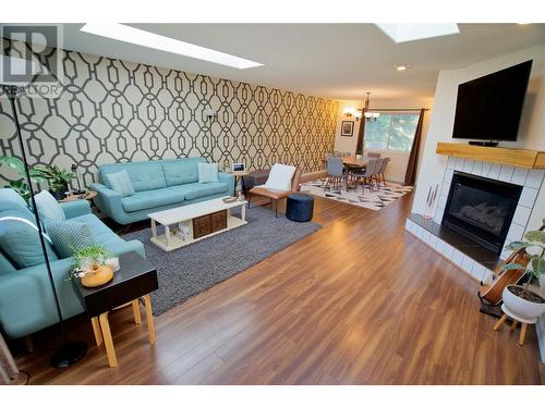 454 Corina Avenue, Princeton, BC - Indoor Photo Showing Living Room With Fireplace