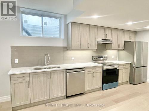 Bsmnt - 220 Bowman Drive, Middlesex Centre (Ilderton), ON - Indoor Photo Showing Kitchen With Stainless Steel Kitchen With Double Sink