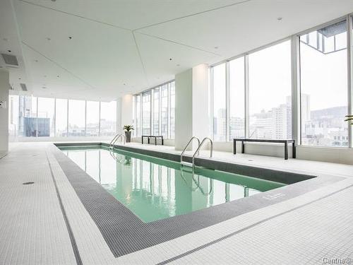 Pool - 303-1155 Rue De La Montagne, Montréal (Ville-Marie), QC - Indoor Photo Showing Other Room With In Ground Pool