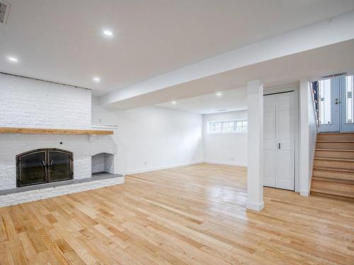 Family room - 152 Rue De Callières, Saint-Bruno-De-Montarville, QC - Indoor Photo Showing Living Room With Fireplace