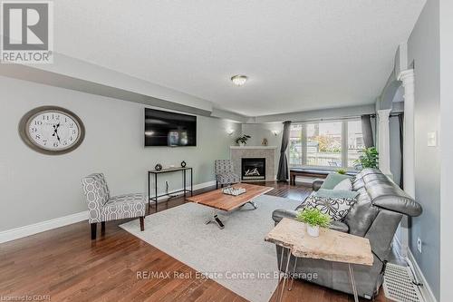 61 Marsh Crescent, Guelph (Pine Ridge), ON - Indoor Photo Showing Living Room With Fireplace