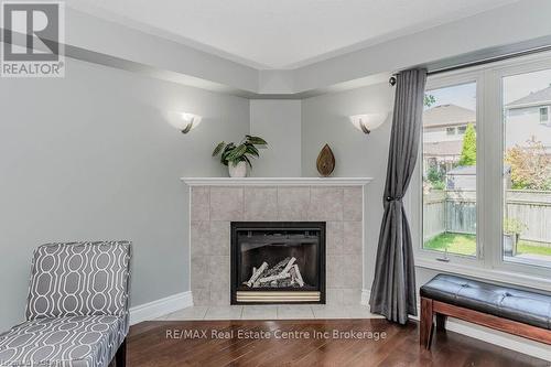 61 Marsh Crescent, Guelph (Pine Ridge), ON - Indoor Photo Showing Living Room With Fireplace