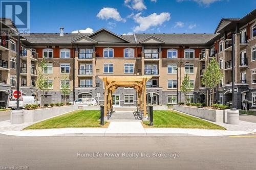 319 - 106 Bard Boulevard, Guelph (Pine Ridge), ON - Outdoor With Balcony With Facade