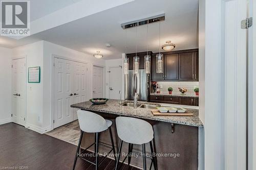 319 - 106 Bard Boulevard, Guelph (Pine Ridge), ON - Indoor Photo Showing Kitchen With Double Sink