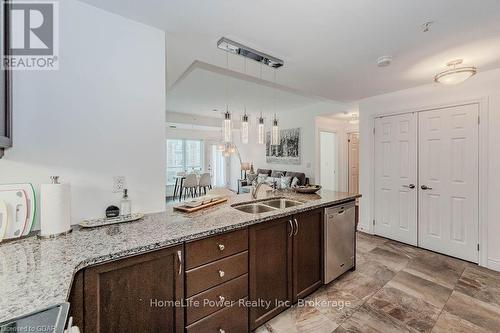 319 - 106 Bard Boulevard, Guelph (Pine Ridge), ON - Indoor Photo Showing Kitchen With Double Sink