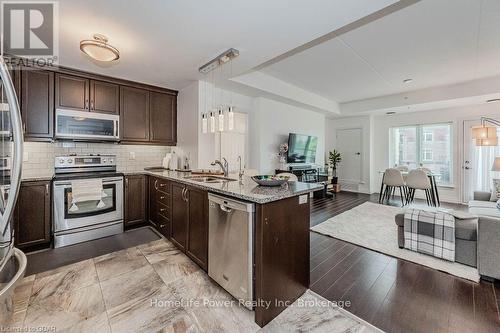 319 - 106 Bard Boulevard, Guelph (Pine Ridge), ON - Indoor Photo Showing Kitchen With Stainless Steel Kitchen With Double Sink With Upgraded Kitchen