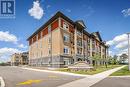 319 - 106 Bard Boulevard, Guelph (Pine Ridge), ON  - Outdoor With Balcony With Facade 