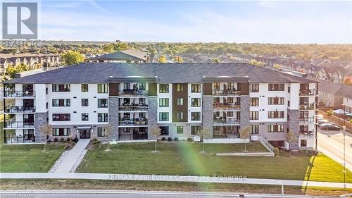 408 - 104 Summit Ridge Drive, Guelph (Grange Hill East), ON - Outdoor With Balcony With Facade