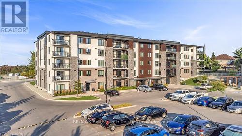 408 - 104 Summit Ridge Drive, Guelph (Grange Hill East), ON - Outdoor With Balcony With Facade