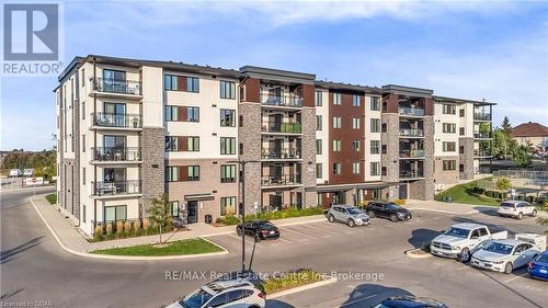 408 - 104 Summit Ridge Drive, Guelph (Grange Hill East), ON - Outdoor With Balcony With Facade