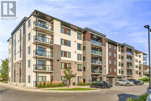 408 - 104 Summit Ridge Drive, Guelph (Grange Hill East), ON - Outdoor With Balcony With Facade