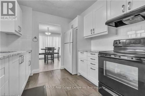 205 - 358 Waterloo Avenue, Guelph (Central West), ON - Indoor Photo Showing Kitchen