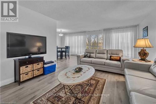 205 - 358 Waterloo Avenue, Guelph (Central West), ON - Indoor Photo Showing Living Room