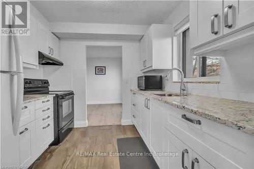 205 - 358 Waterloo Avenue, Guelph (Central West), ON - Indoor Photo Showing Kitchen