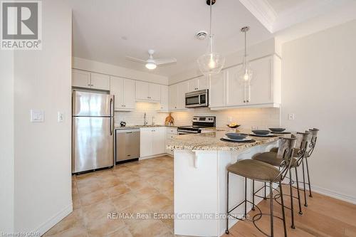 D403 - 71 Bayberry Drive, Guelph (Village), ON - Indoor Photo Showing Kitchen With Upgraded Kitchen