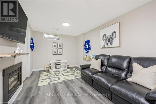 36 - 125 Sekura Crescent, Cambridge, ON - Indoor Photo Showing Living Room With Fireplace