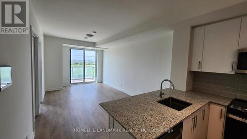 406 - 345 Wheat Boom Drive, Oakville, ON - Indoor Photo Showing Kitchen