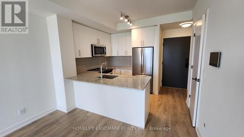 406 - 345 Wheat Boom Drive, Oakville, ON - Indoor Photo Showing Kitchen