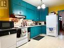 107 Carl Avenue W, Langenburg, SK  - Indoor Photo Showing Kitchen With Double Sink 