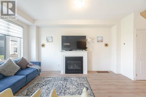 23 Povey Road, Centre Wellington, ON - Indoor Photo Showing Living Room With Fireplace