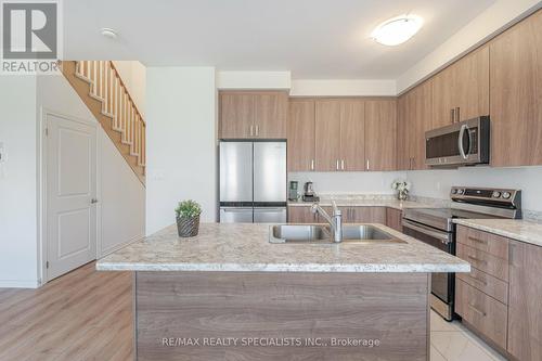 23 Povey Road, Centre Wellington, ON - Indoor Photo Showing Kitchen With Stainless Steel Kitchen With Double Sink With Upgraded Kitchen