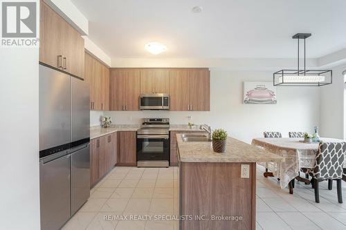 23 Povey Road, Centre Wellington, ON - Indoor Photo Showing Kitchen With Stainless Steel Kitchen With Double Sink