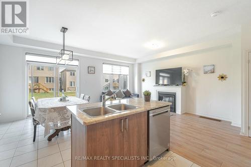 23 Povey Road, Centre Wellington, ON - Indoor Photo Showing Kitchen With Double Sink