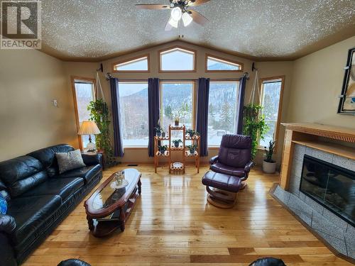 3637 Broadwater Road, Robson, BC - Indoor Photo Showing Living Room With Fireplace