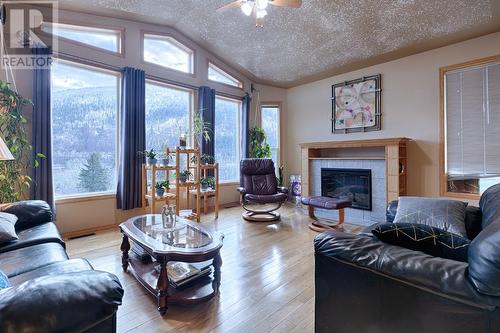 3637 Broadwater Road, Robson, BC - Indoor Photo Showing Living Room With Fireplace