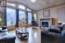 3637 Broadwater Road, Robson, BC  - Indoor Photo Showing Living Room With Fireplace 