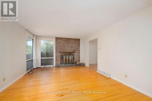 1858 Appleford Street, Ottawa, ON - Indoor Photo Showing Living Room With Fireplace